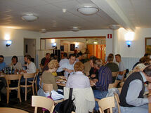 People having lunch in a restaurant. Photo.